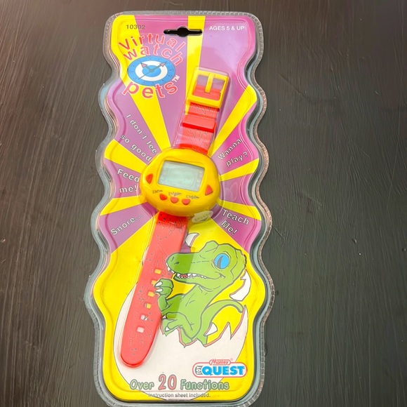 Manley Toy Quest 1997 🦖Virtual Pet Watch Electronic Game Rare HTF🦖 - Picture 1 of 5